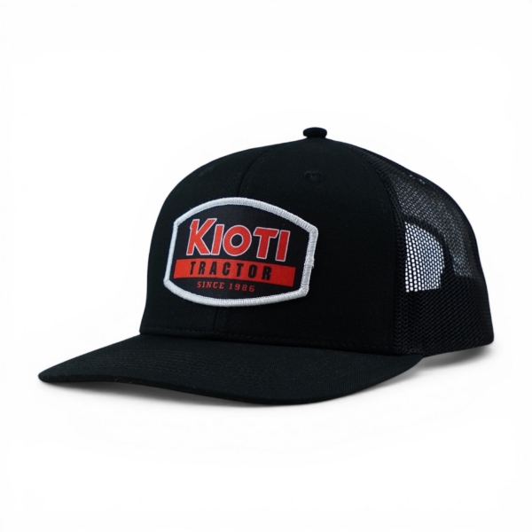 Angled front view of black Kioti Tractor mesh back cap with embroidered logo patch on crown